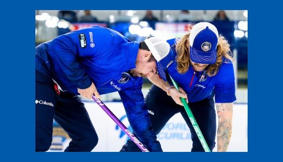 People sweeping in a curling competition