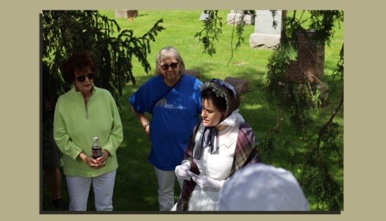 Julie watching actor in graveside tales
