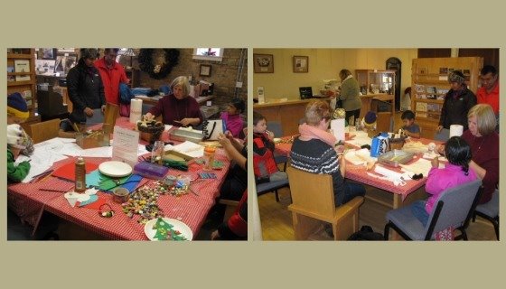 Julie with kids doing holiday crafts, Julie at table with kids making cornhusk dolls