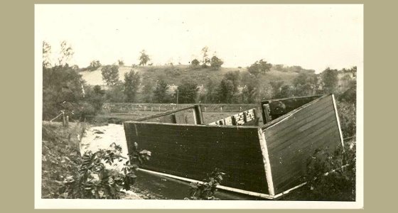 Shed completely flipped over.
