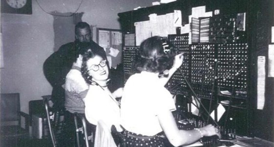 Operators working a phone switching board