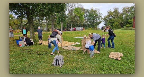 Kids doing an activity at Fall at the Farm event