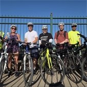 a group of people with their bikes