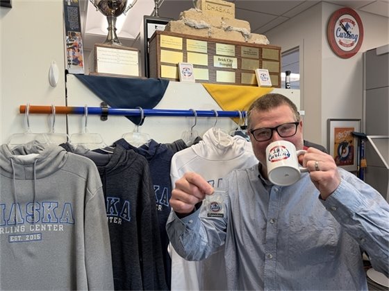 Member holding member appreciation gifts