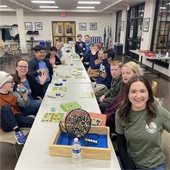 a group of people playing bingo