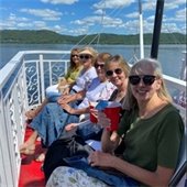  a group of women on a boat ride