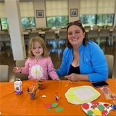 Picture of a mom with her child doing an art activity